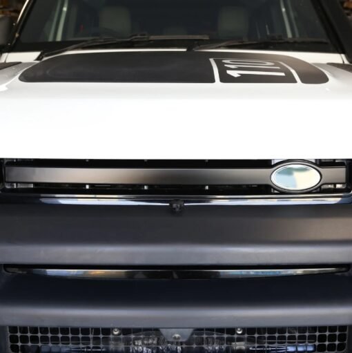 Cover of the Front Grille Bar in Matt Black for Land Rover Defender L663